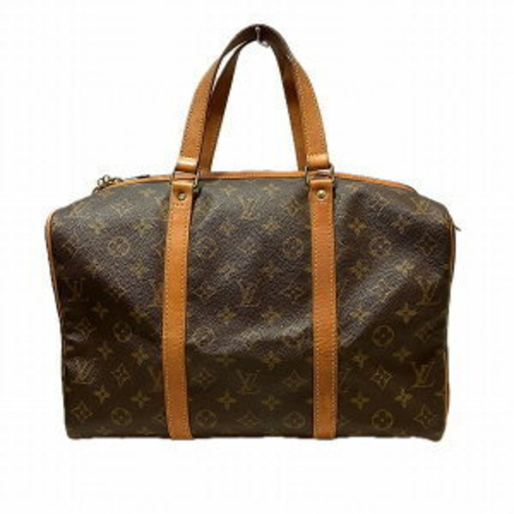Louis Vuitton Monogram Sax Souple Handbag